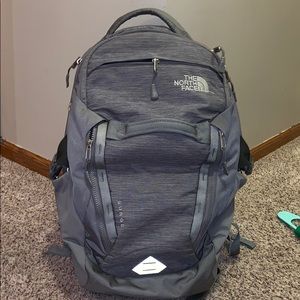 grey north face surge backpack
